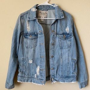 Distressed denim jacket
